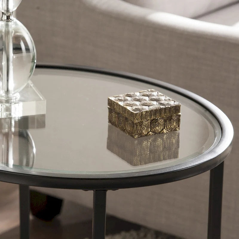 Table d'appoint ovale en métal à volutes avec plateau en verre trempé biseauté