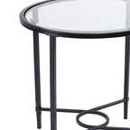 Table d'appoint ovale en métal à volutes avec plateau en verre trempé biseauté