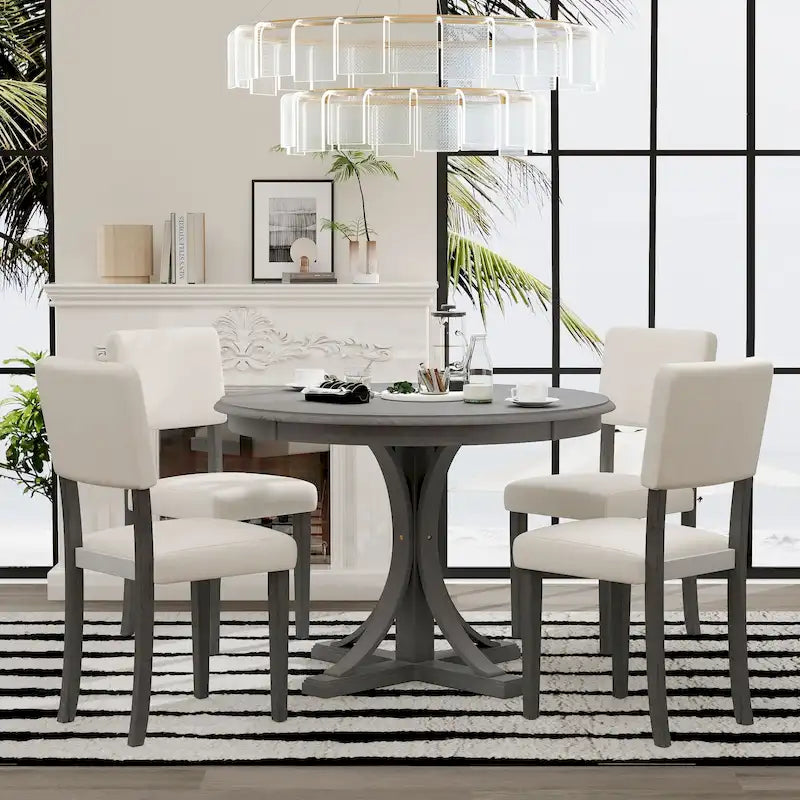 Table à manger ronde avec pieds tréteaux incurvés